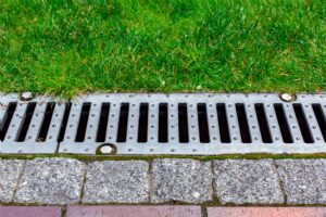 gray,grating,of,the,drainage,system,for,drainage,of,rainwater