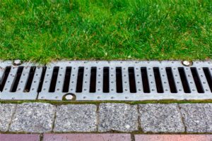 gray,grating,of,the,drainage,system,for,drainage,of,rainwater